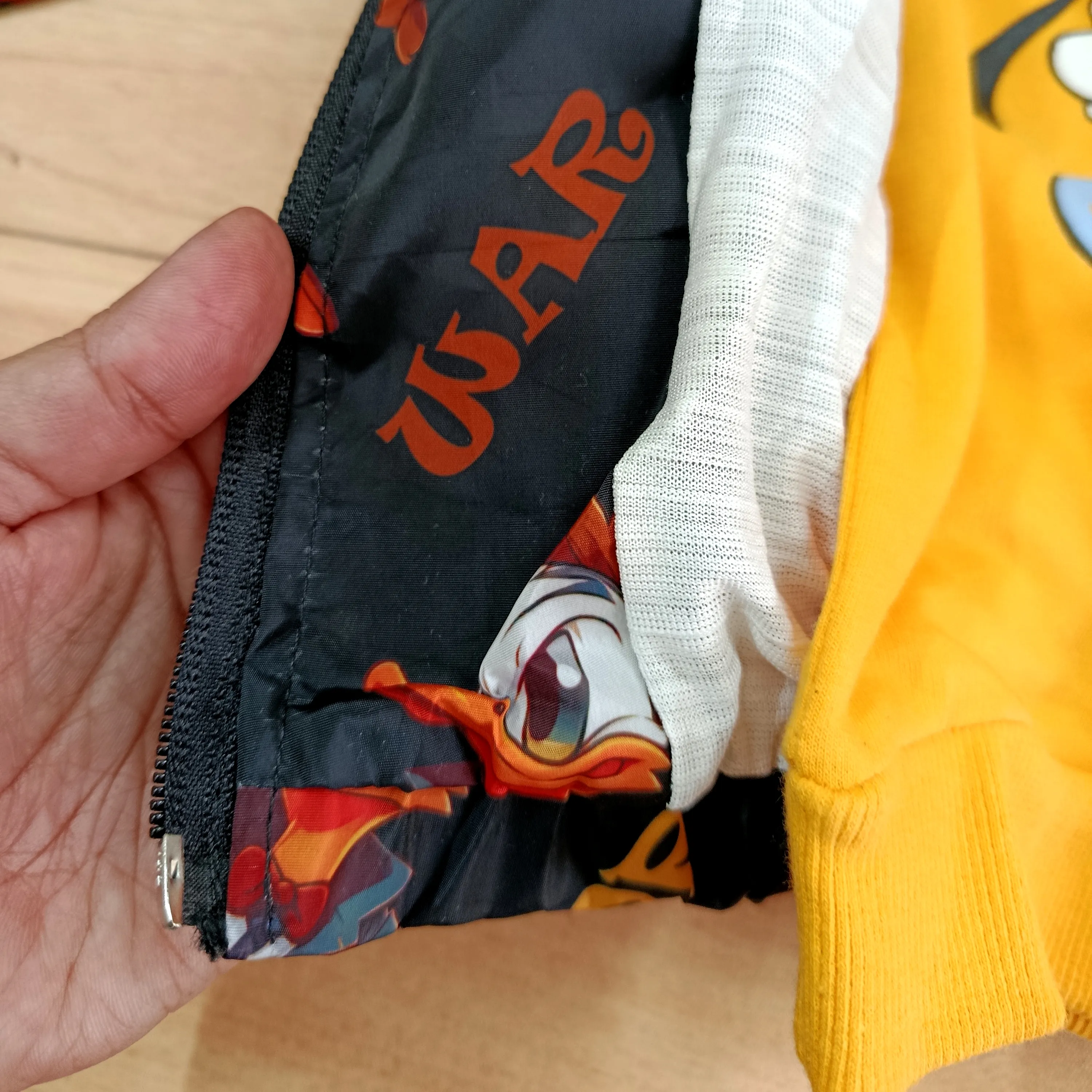 سویشرت بارانی بچگانه طرح duck رنگ مشکی