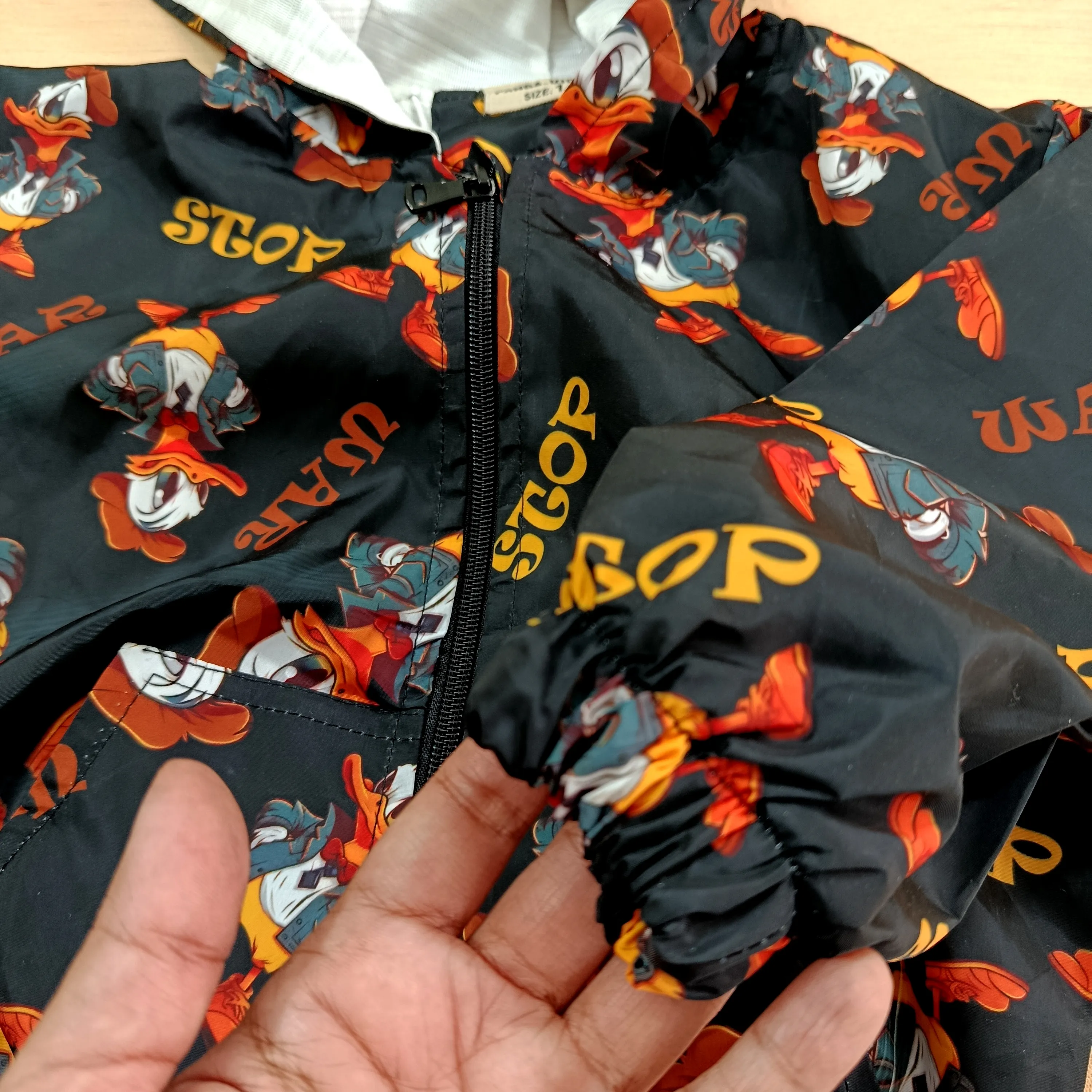 سویشرت بارانی بچگانه طرح duck رنگ مشکی